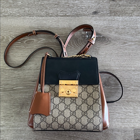 Gucci Handbags - Gucci GG Supreme Canvas & Leather Padlock Backpack